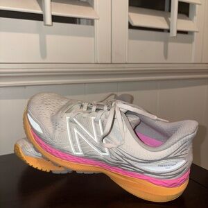 new balance women's gray and pink athletic shoes